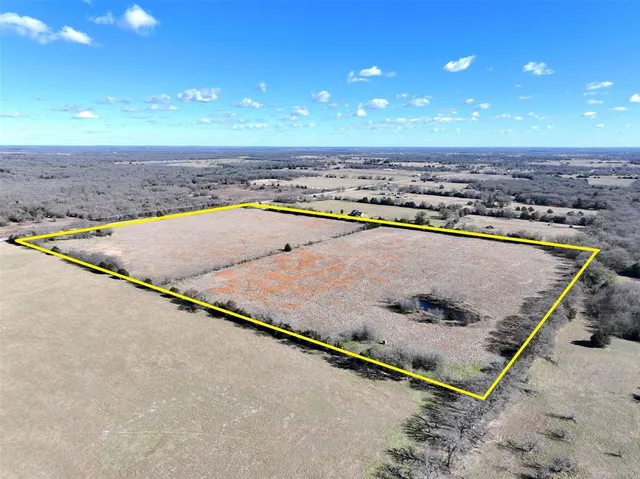 a view of an outdoor space and tennis court