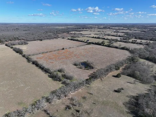 a view of a beach and a mountain view in back