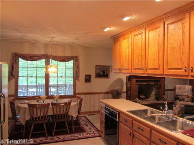 2129 Bethesda Church Road Madison, NC 27025 - Photo 11 of 16 Kitchen. Kitchen with custom oak cabinets