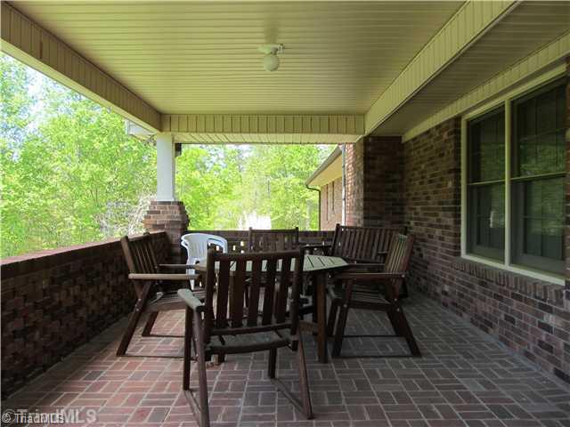 2129 Bethesda Church Road Madison, NC 27025 - Photo 7 of 16 Other. Covered back porch.
