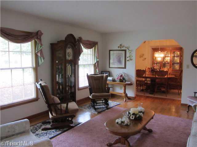 2129 Bethesda Church Road Madison, NC 27025 - Photo 8 of 16 Living Room. Living Room with hardwood floors.