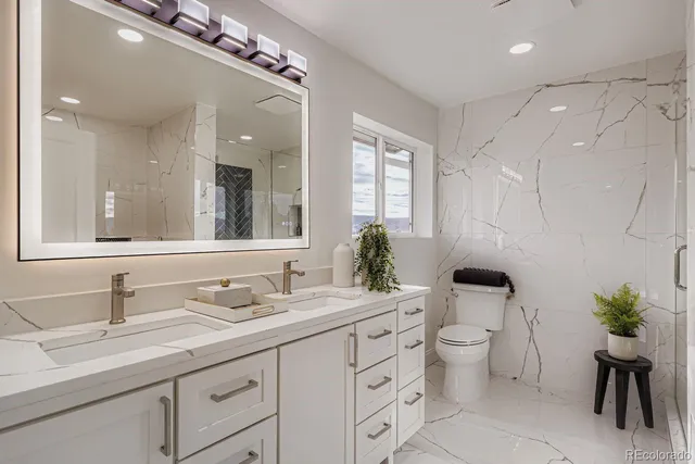 a bathroom with a shower and a sink