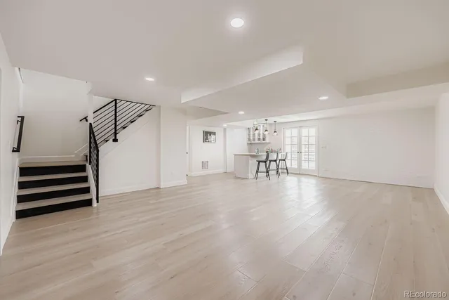 a view of balcony with wooden floor