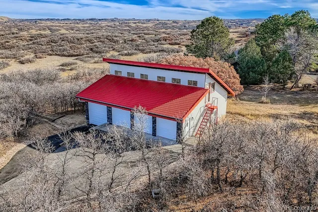 a front view of a house with a garage