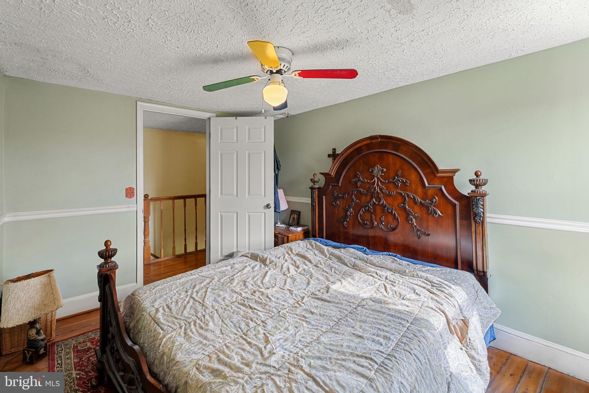 420 Russell Road Berryville, VA 22611 - Photo 36 of 60 Charming bedroom with vintage flair.
