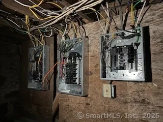 a view of walk in closet with clothes