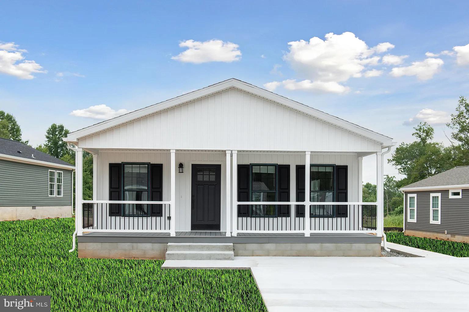 front view of a house with a yard
