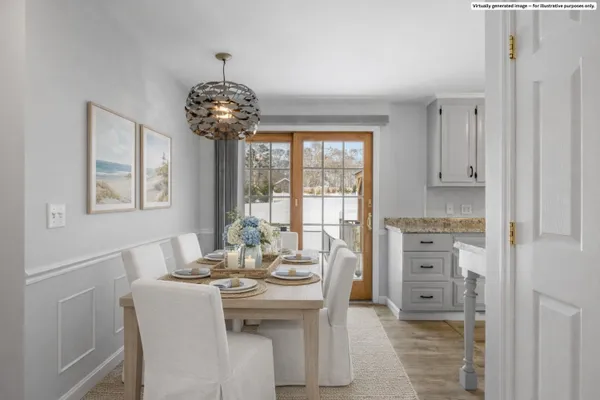 a dining room with furniture and chandelier