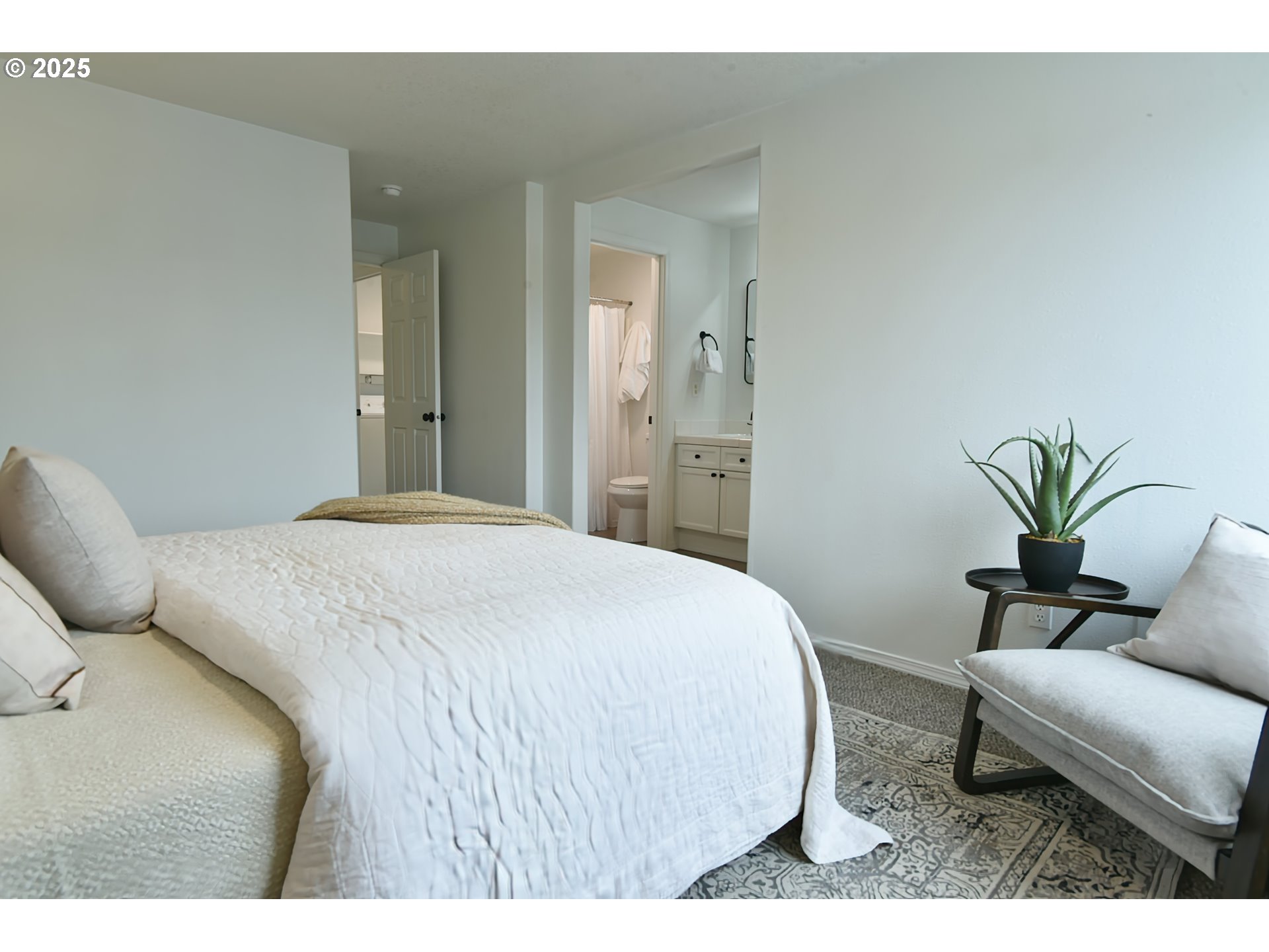 20382 Southwest Monson Street Beaverton, OR 97003 - Photo 22 of 28 a bedroom with a bed and a couch