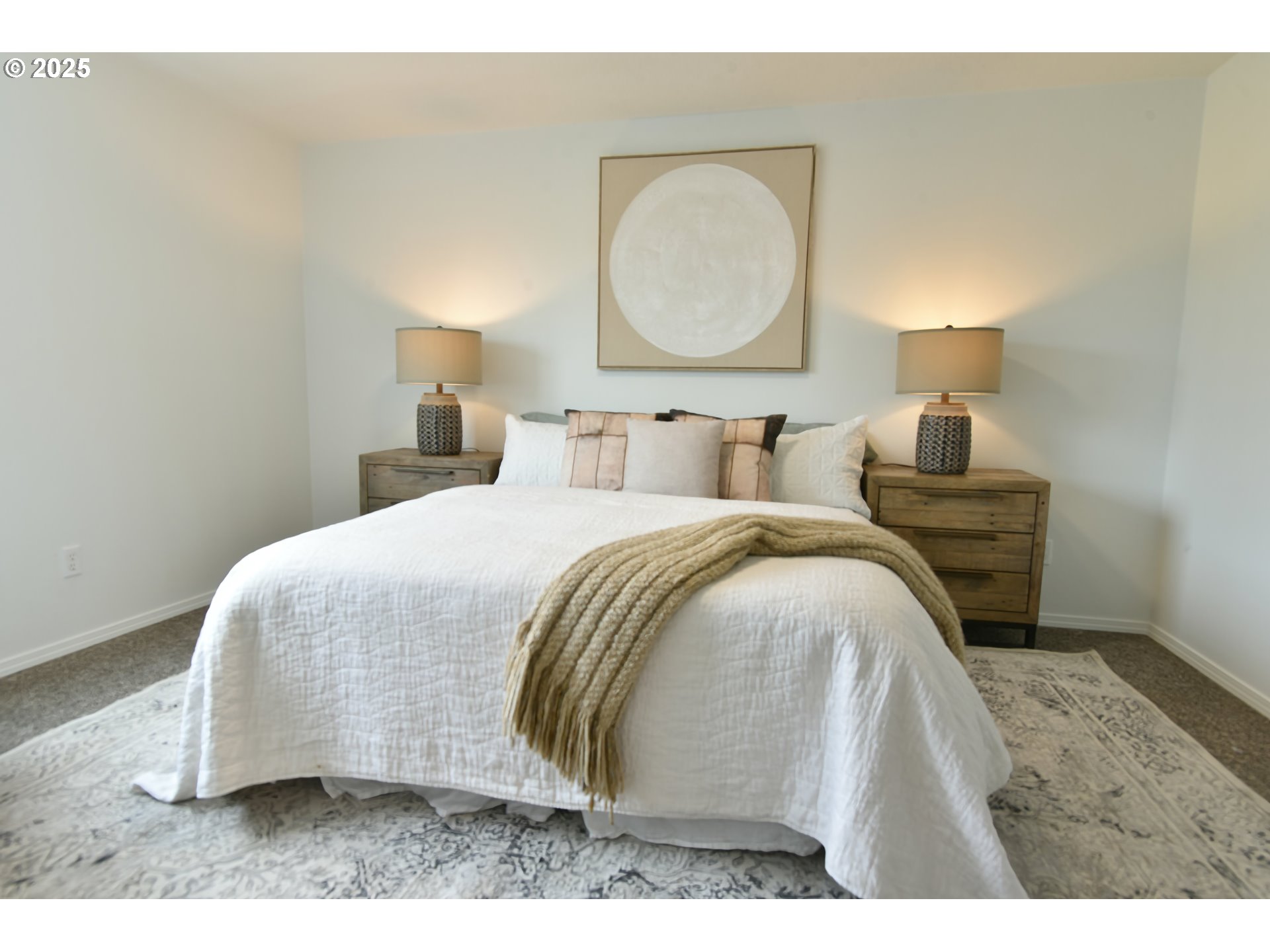 20382 Southwest Monson Street Beaverton, OR 97003 - Photo 23 of 28 a bedroom with a bed and a lamp