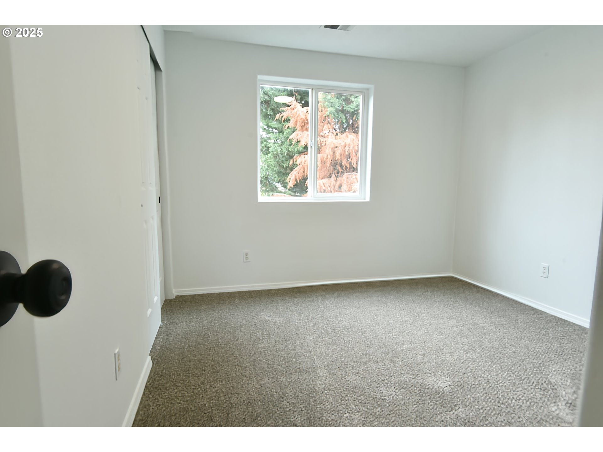 20382 Southwest Monson Street Beaverton, OR 97003 - Photo 26 of 28 a view of an empty room with a window