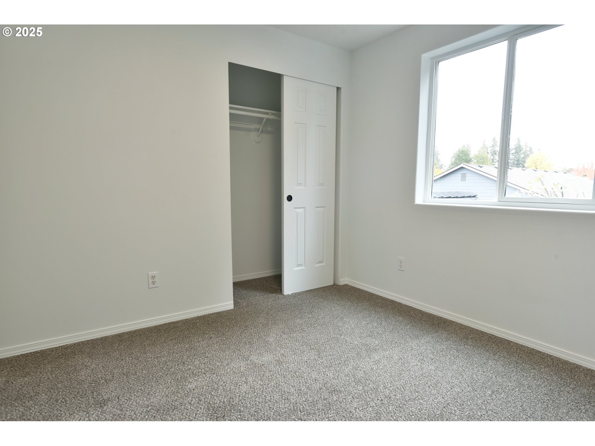 20382 Southwest Monson Street Beaverton, OR 97003 - Photo 27 of 28 a view of an empty room with a window