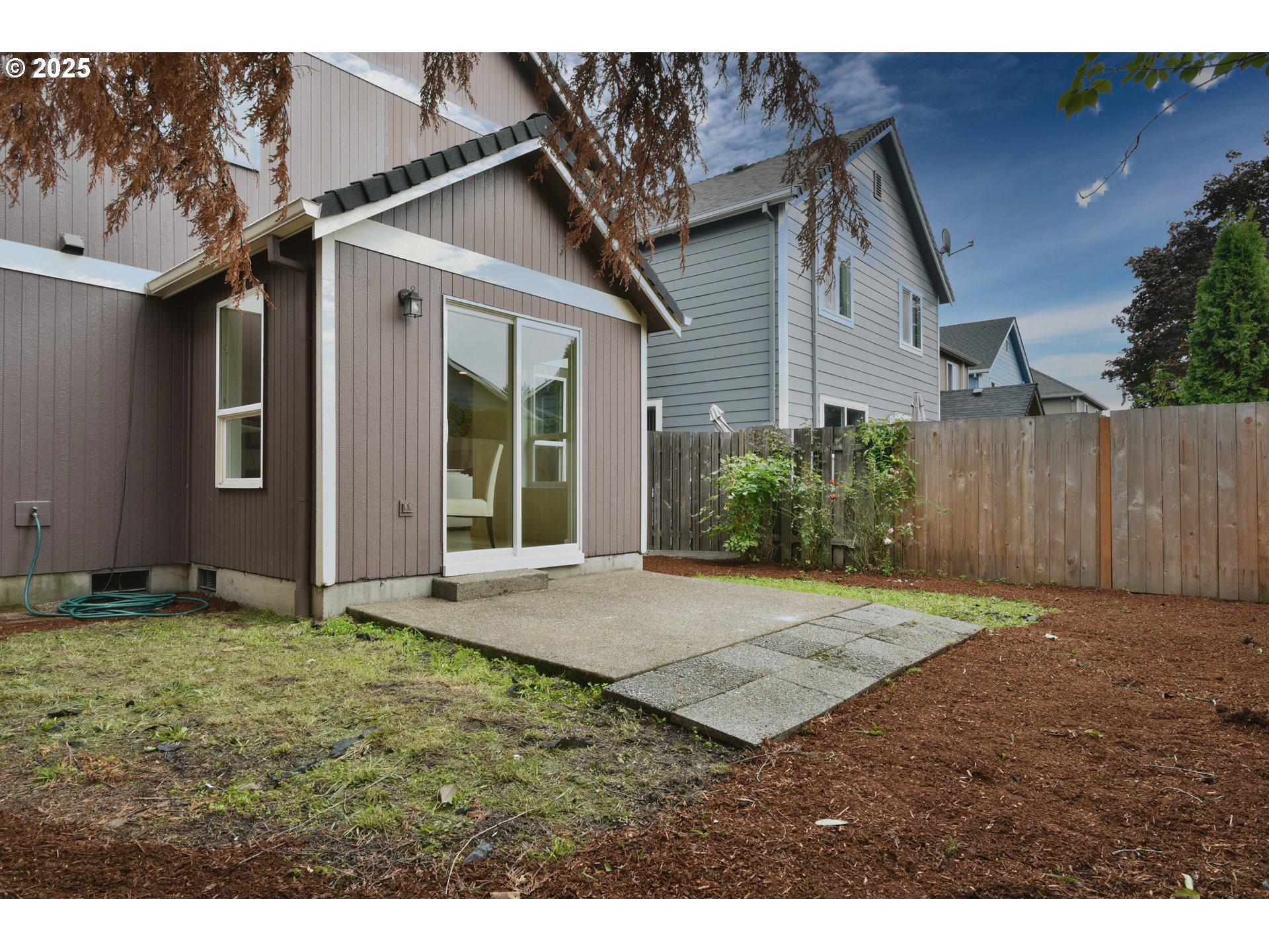 20382 Southwest Monson Street Beaverton, OR 97003 - Photo 8 of 28 a view of a backyard of the house