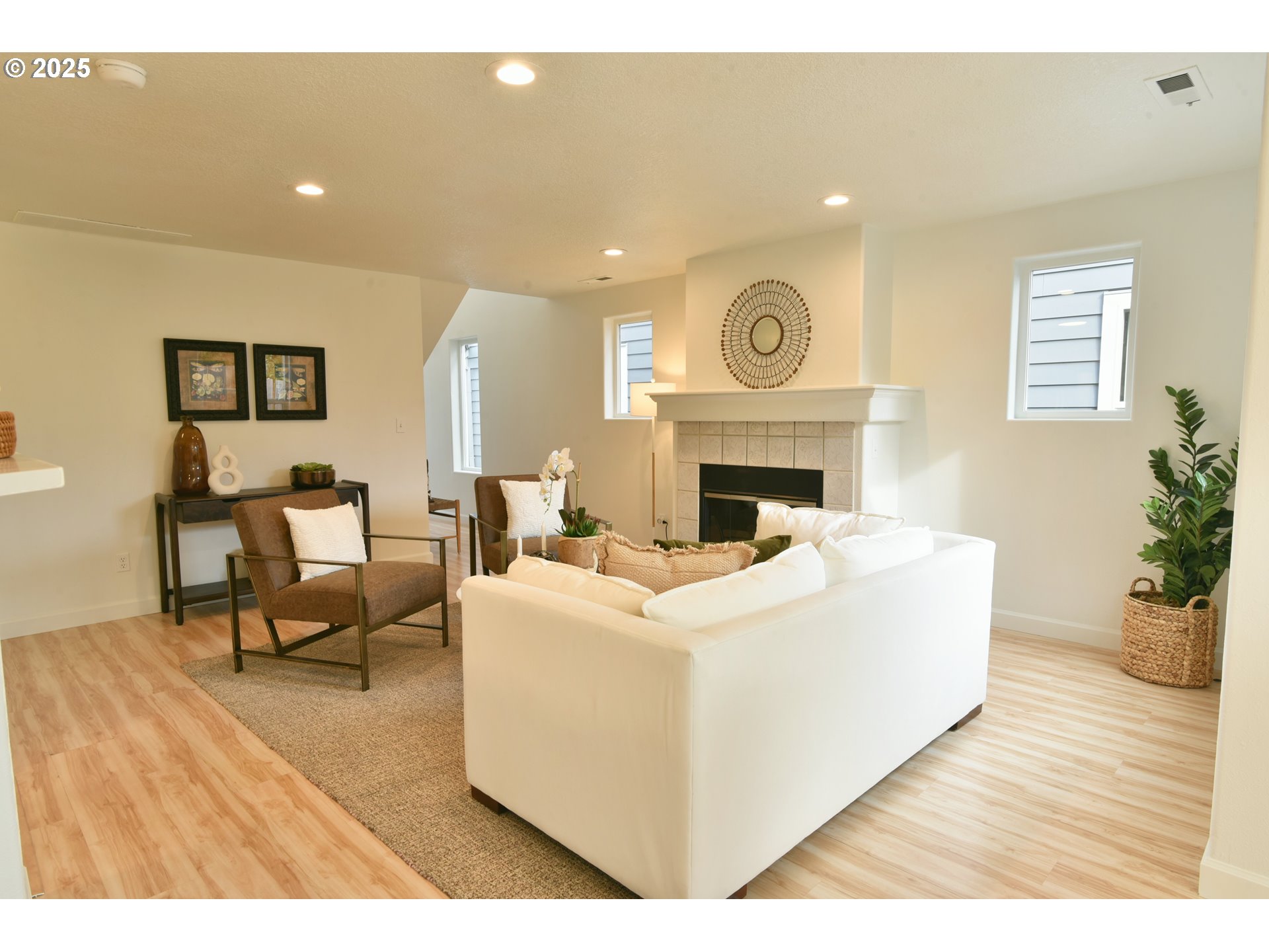 20382 Southwest Monson Street Beaverton, OR 97003 - Photo 9 of 28 a living room with furniture and a fireplace