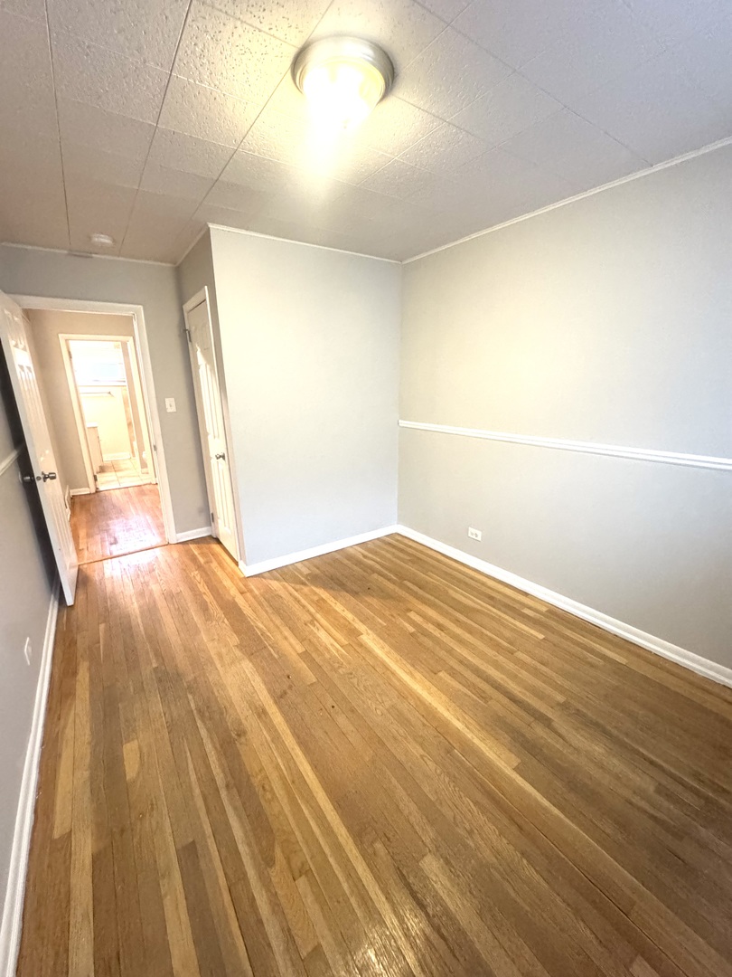 1834 Terrace Road Homewood, IL 60430 - Photo 11 of 21 a view of empty room with wooden floor