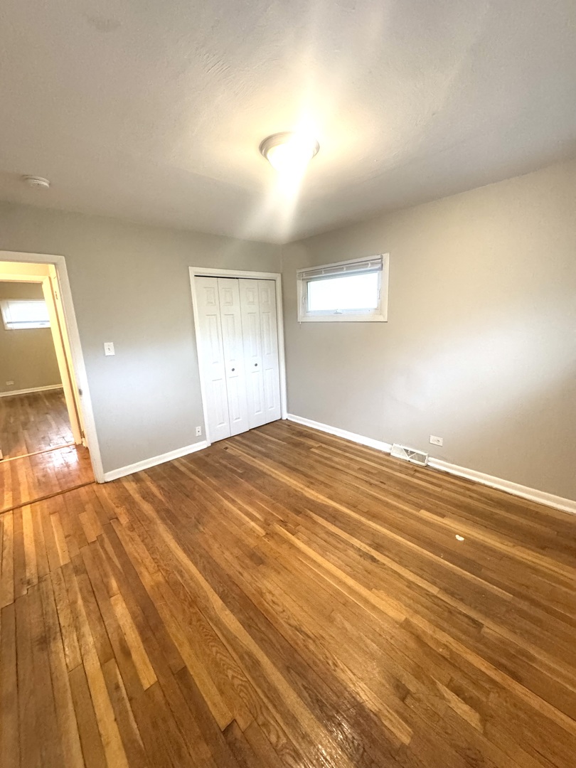1834 Terrace Road Homewood, IL 60430 - Photo 13 of 21 a view of empty room with wooden floor