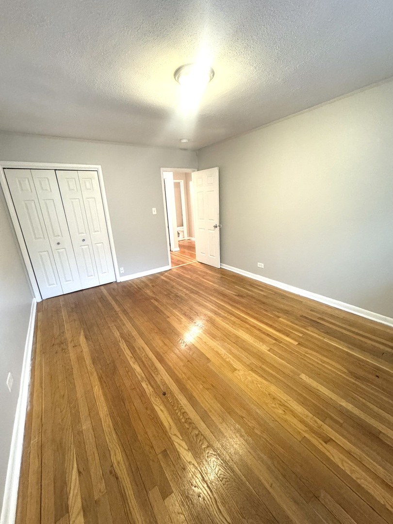 1834 Terrace Road Homewood, IL 60430 - Photo 16 of 21 a bedroom with a bed and a window