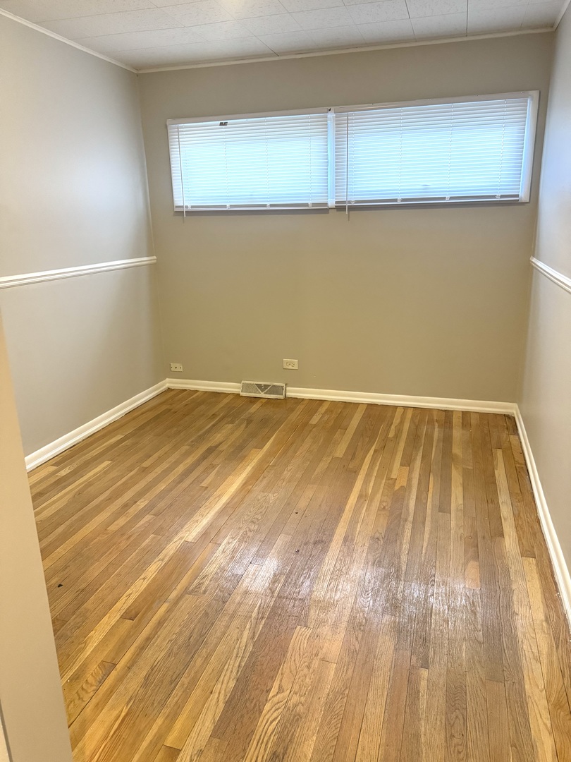 1834 Terrace Road Homewood, IL 60430 - Photo 10 of 21 a view of a room with wooden floor