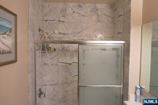 116 The Promenade, Unit 116 Edgewater, NJ 07020 - Photo 16 of 26 a close view of a bathroom shower