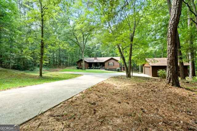 a house with trees in front of it