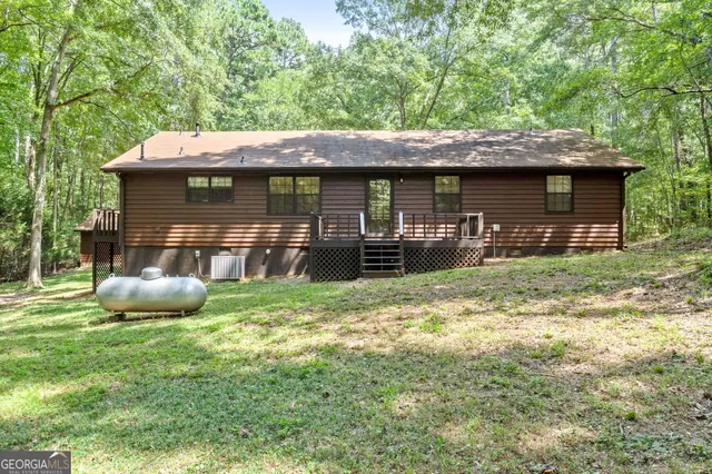 a view of balcony with wooden floor