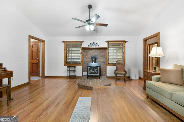 a kitchen with a refrigerator sink and stove