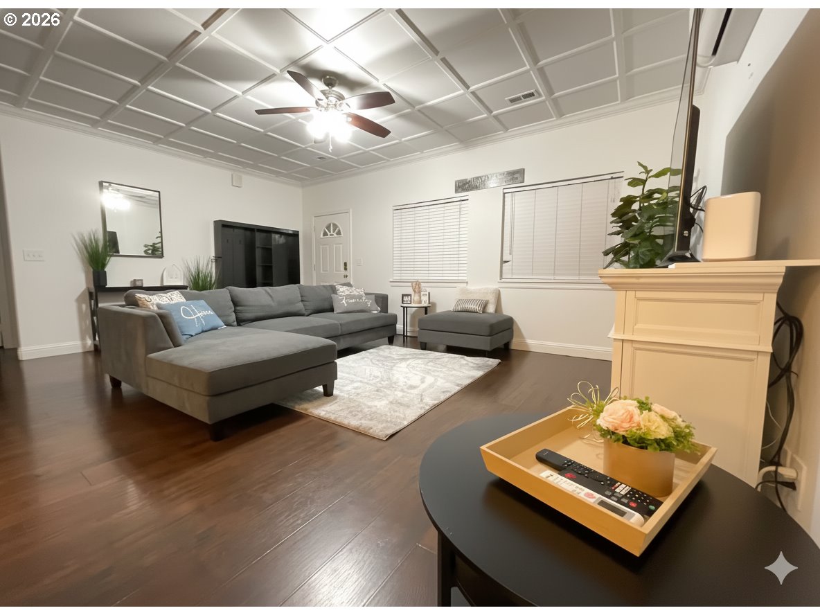 1310 Gales Creek Road Forest Grove, OR 97116 - Photo 11 of 39 a living room with furniture and a flat screen tv