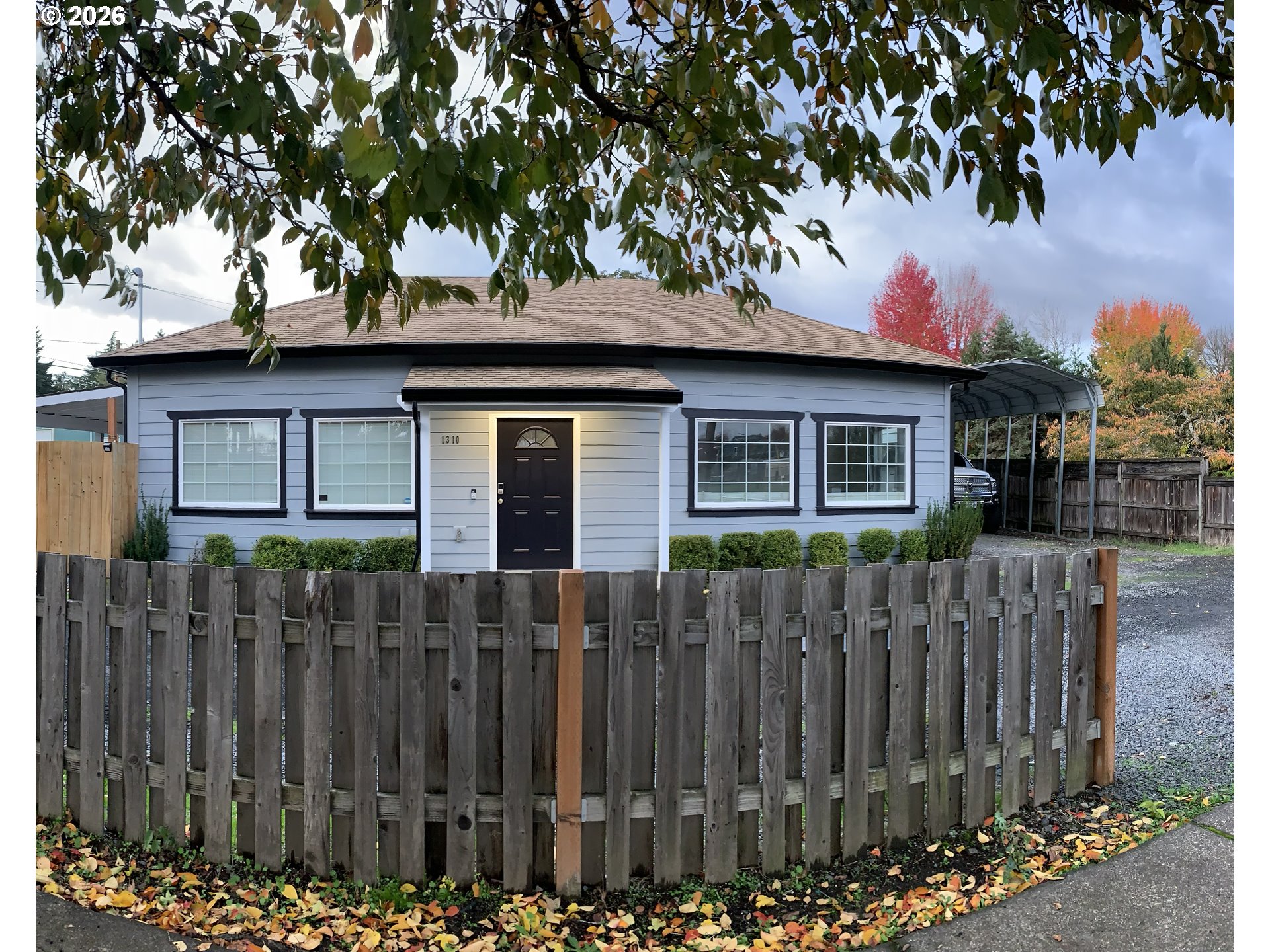 1310 Gales Creek Road Forest Grove, OR 97116 - Photo 2 of 39 a front view of a house with a garden