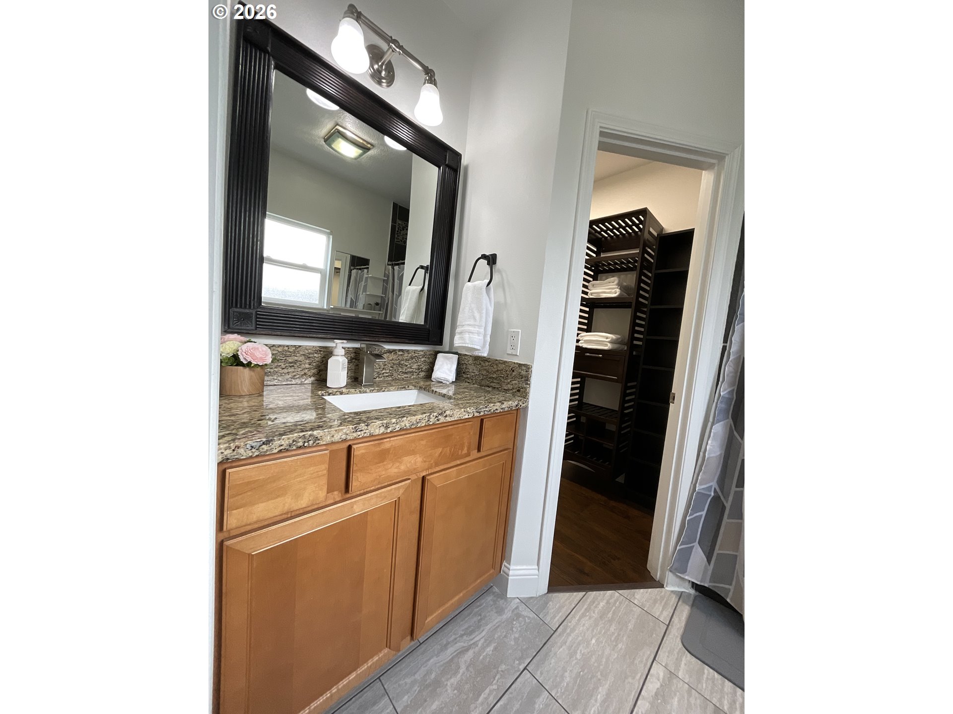 1310 Gales Creek Road Forest Grove, OR 97116 - Photo 26 of 39 a bathroom with a sink and a mirror