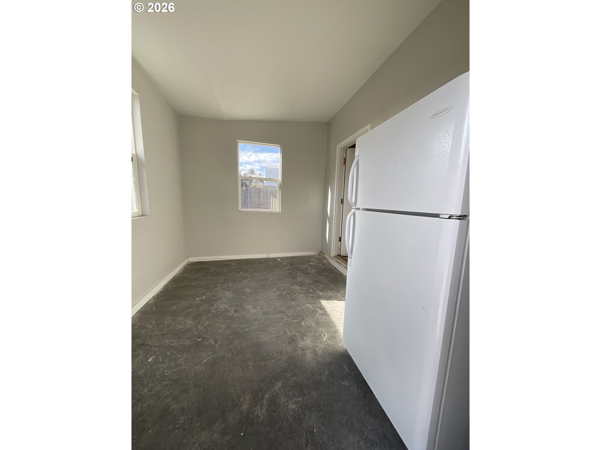 1310 Gales Creek Road Forest Grove, OR 97116 - Photo 30 of 39 a view of a hallway with a white refrigerator