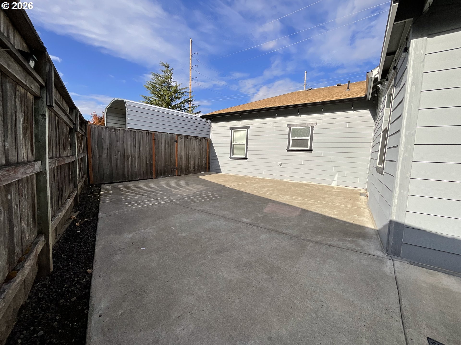 1310 Gales Creek Road Forest Grove, OR 97116 - Photo 34 of 39 a view of backyard with wooden fence and plants