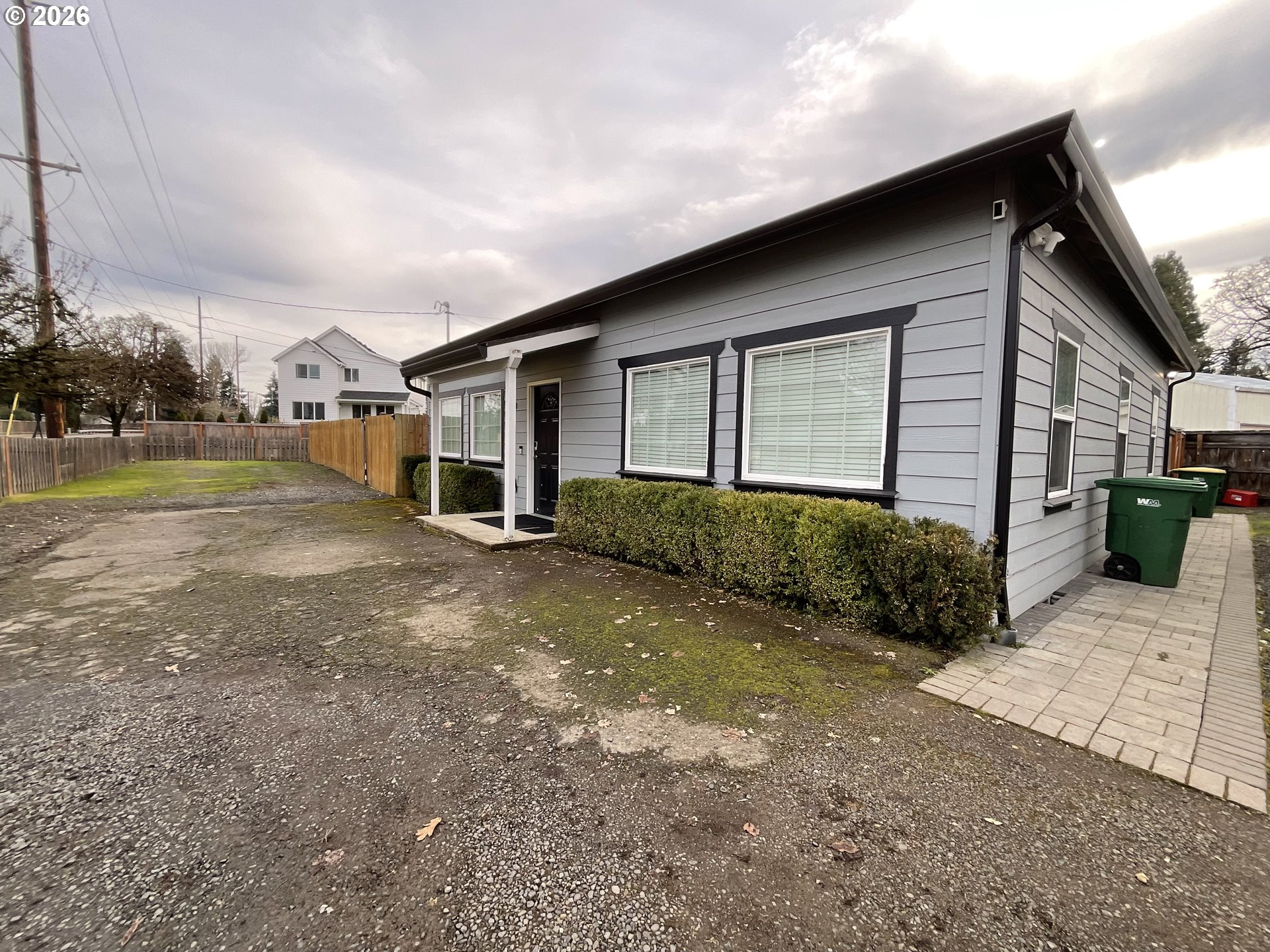 1310 Gales Creek Road Forest Grove, OR 97116 - Photo 5 of 39 a front view of a house with a yard and garage