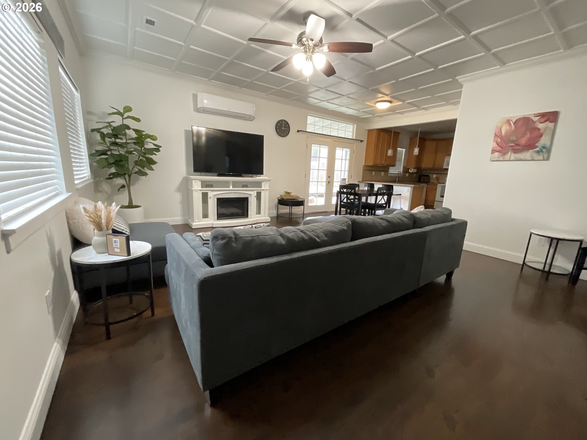1310 Gales Creek Road Forest Grove, OR 97116 - Photo 8 of 39 a living room with furniture and a flat screen tv