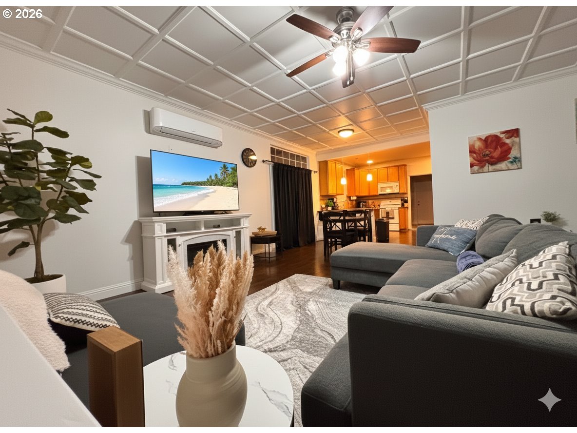 1310 Gales Creek Road Forest Grove, OR 97116 - Photo 9 of 39 a living room with furniture and a fireplace