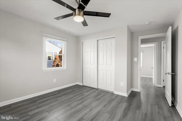 a bathroom with a toilet sink and tub