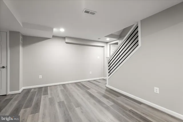 a bathroom with a sink mirror bathtub and toilet