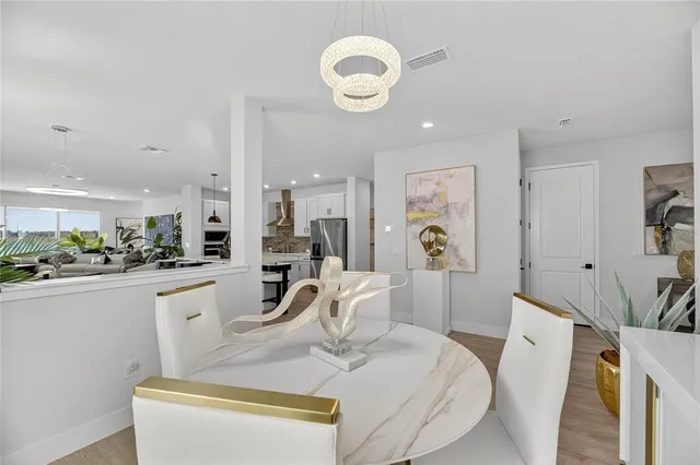 a bathroom with a shower and a sink