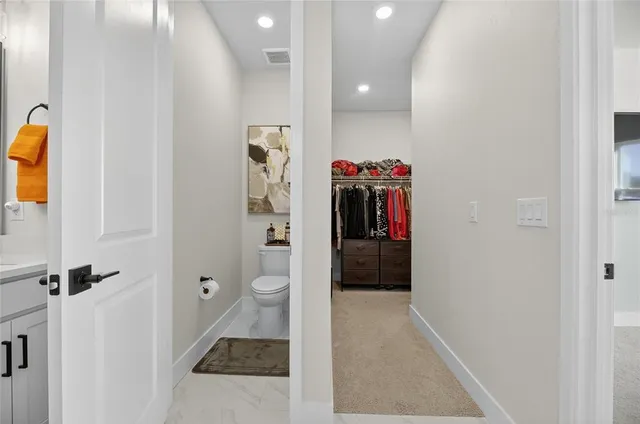 a bed room with a bed and furniture