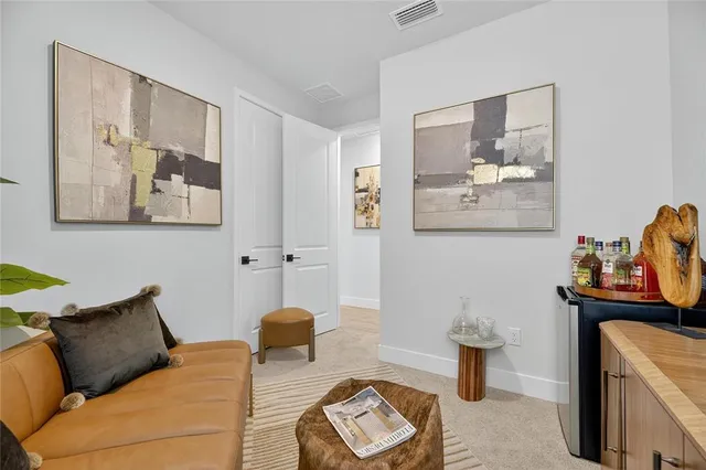 a view of a lake with a house in the background