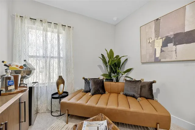 an aerial view of a house with a ocean view