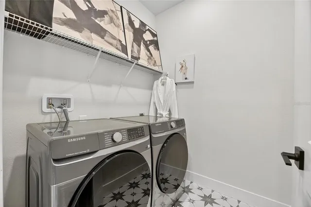 an aerial view of a house with a swimming pool