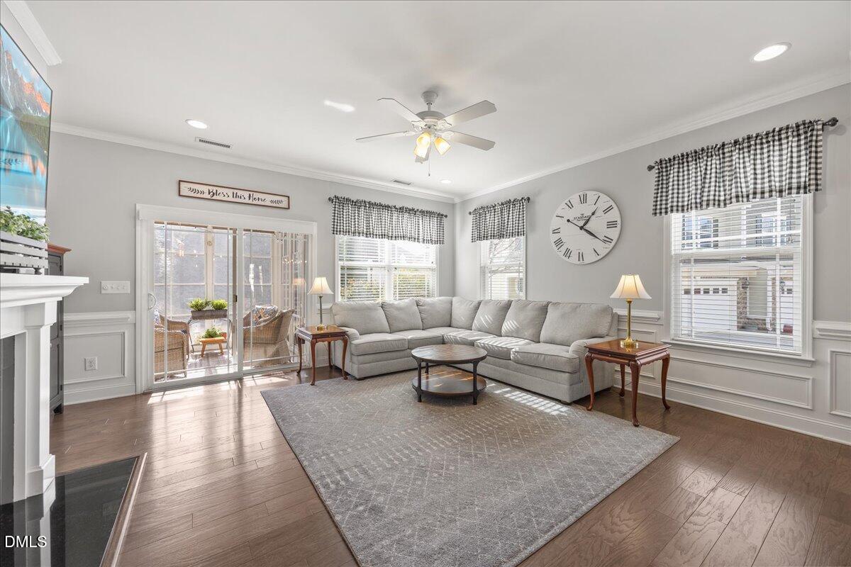 216 Mayfield Drive Apex, NC 27539 - Photo 20 of 66 a living room with furniture and a large window