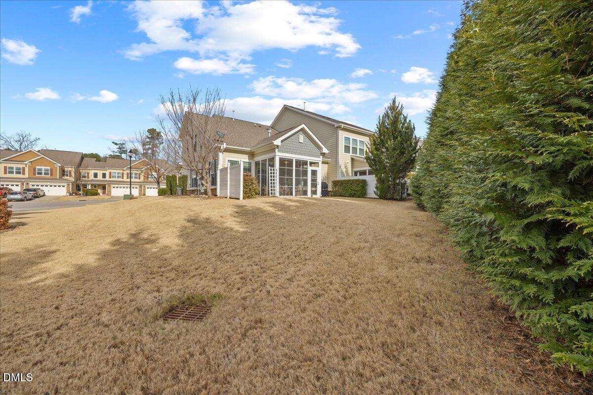 216 Mayfield Drive Apex, NC 27539 - Photo 43 of 66 a front view of a house with a yard