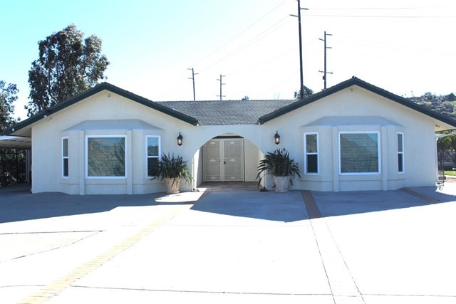 a front view of a house with a porch