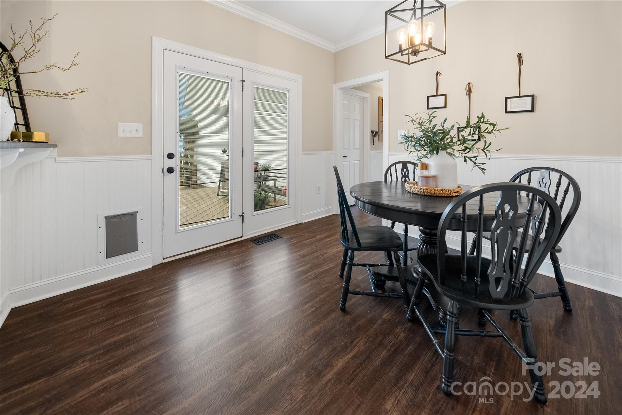 7400 Carl Polk Road Monroe, NC 28110 - Photo 13 of 48 a view of a dining room with furniture and wooden floor