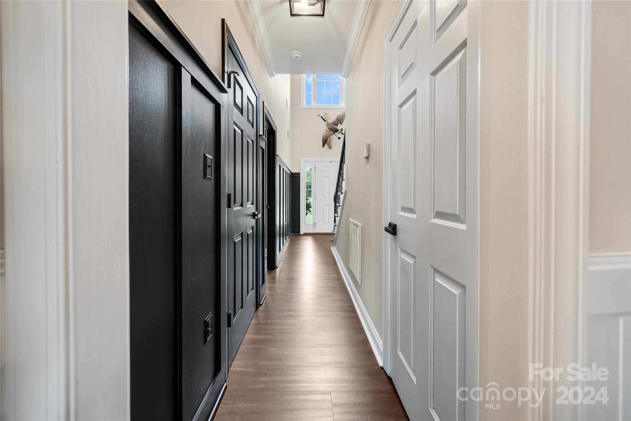 7400 Carl Polk Road Monroe, NC 28110 - Photo 14 of 48 a view of a hallway with wooden floor and entryway