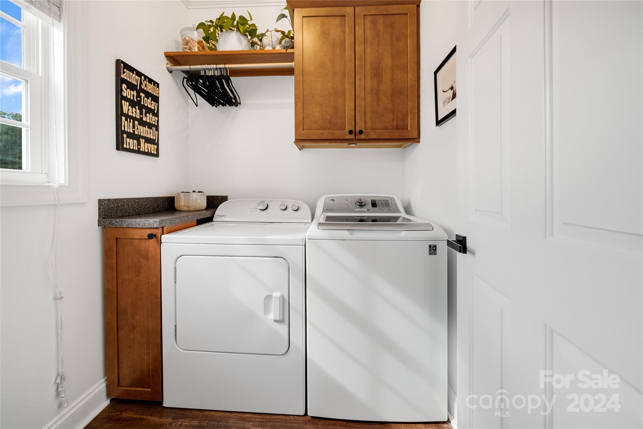 7400 Carl Polk Road Monroe, NC 28110 - Photo 16 of 48 a utility room with dryer and washer