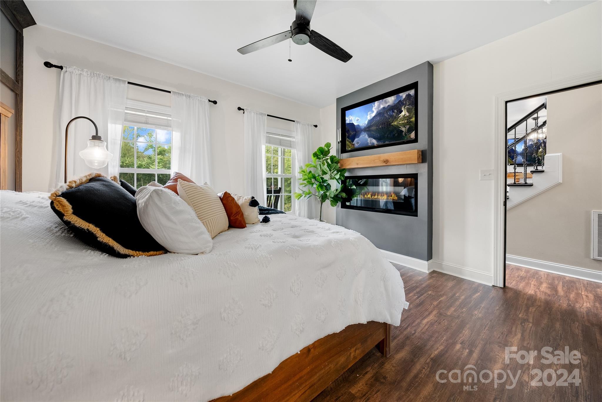 7400 Carl Polk Road Monroe, NC 28110 - Photo 20 of 48 a bedroom with a large bed and a large window