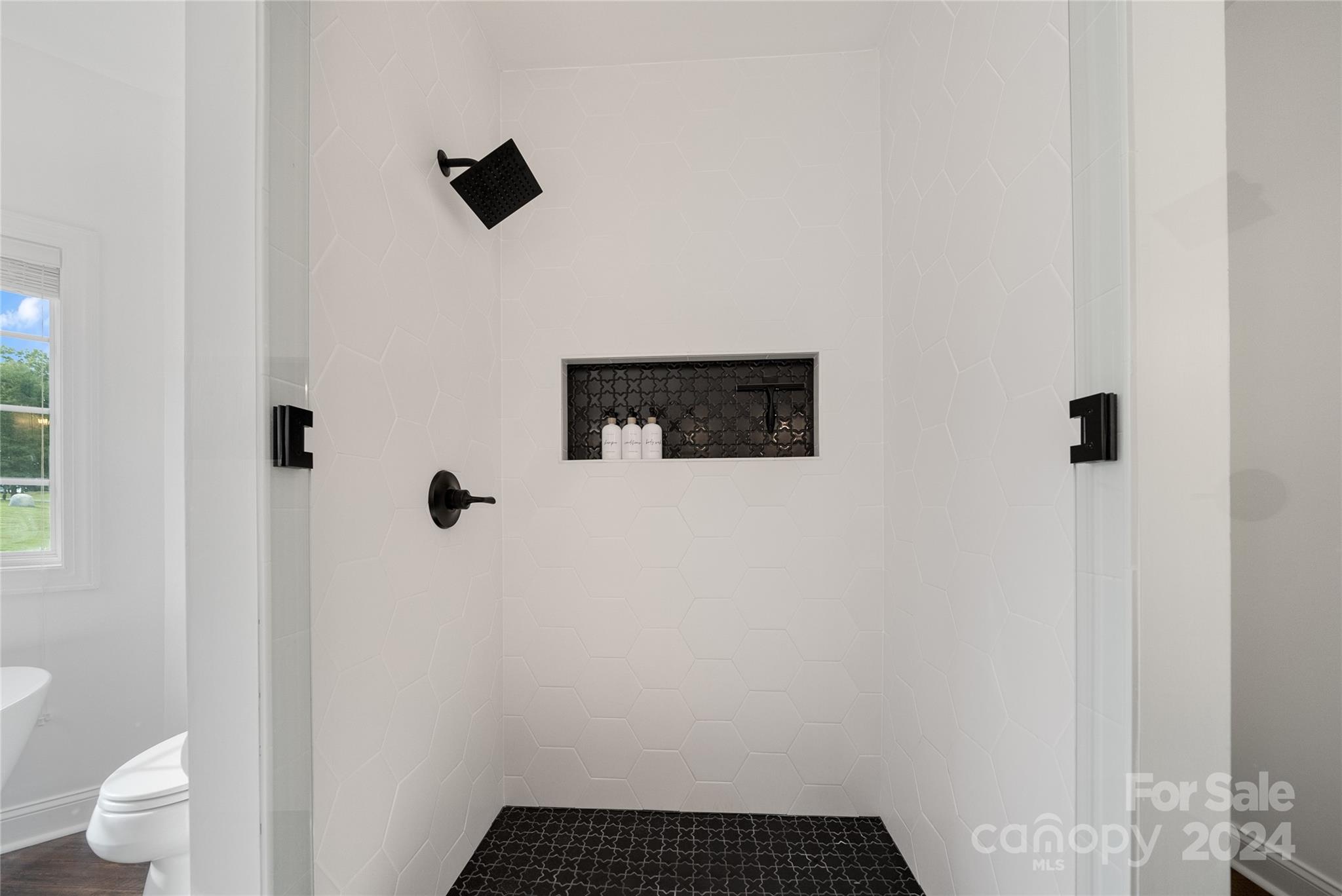 7400 Carl Polk Road Monroe, NC 28110 - Photo 23 of 48 a bathroom with a sink and a toilet