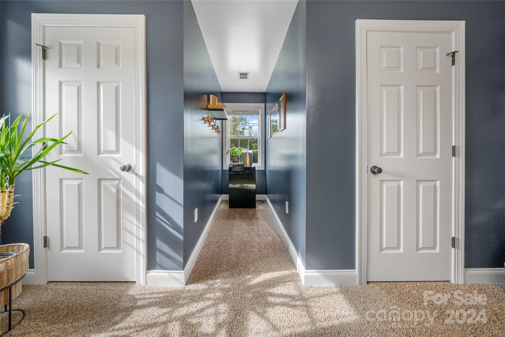 7400 Carl Polk Road Monroe, NC 28110 - Photo 27 of 48 a view of a hallway with wooden floor and staircase